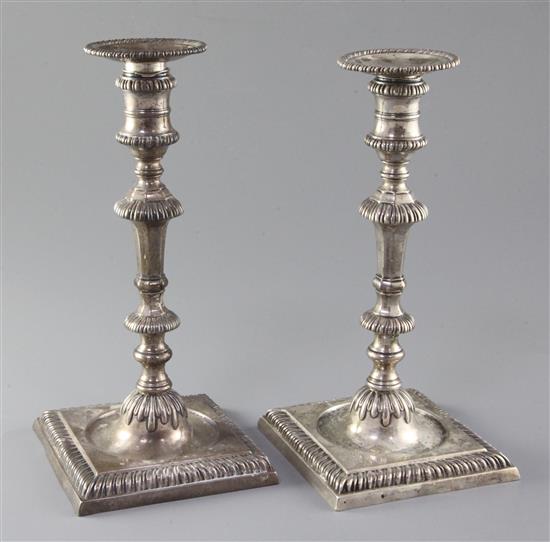 A pair of late George II cast silver candlesticks by Thomas Whipham and Charles Wright, 45 oz.